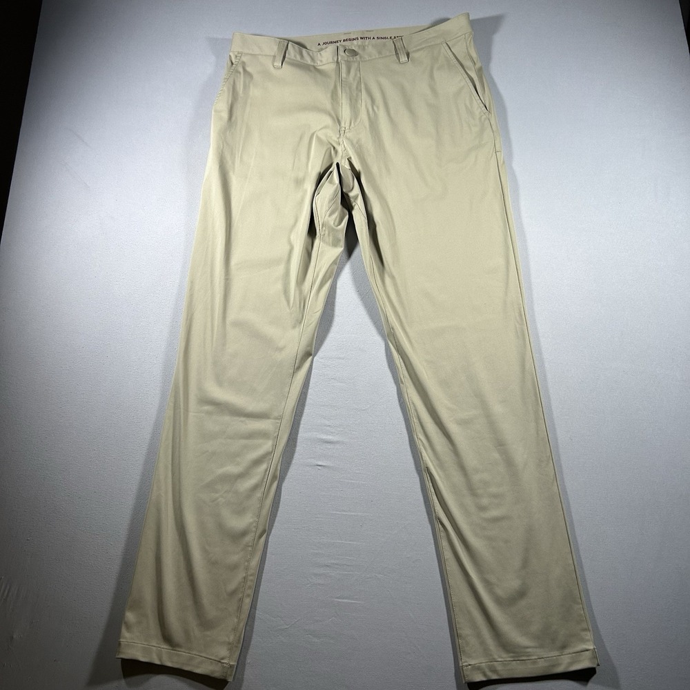 NWT Mens Rhone Commuter Slim Fit Pants 34x32 Tan Performance Golf Travel Casual
